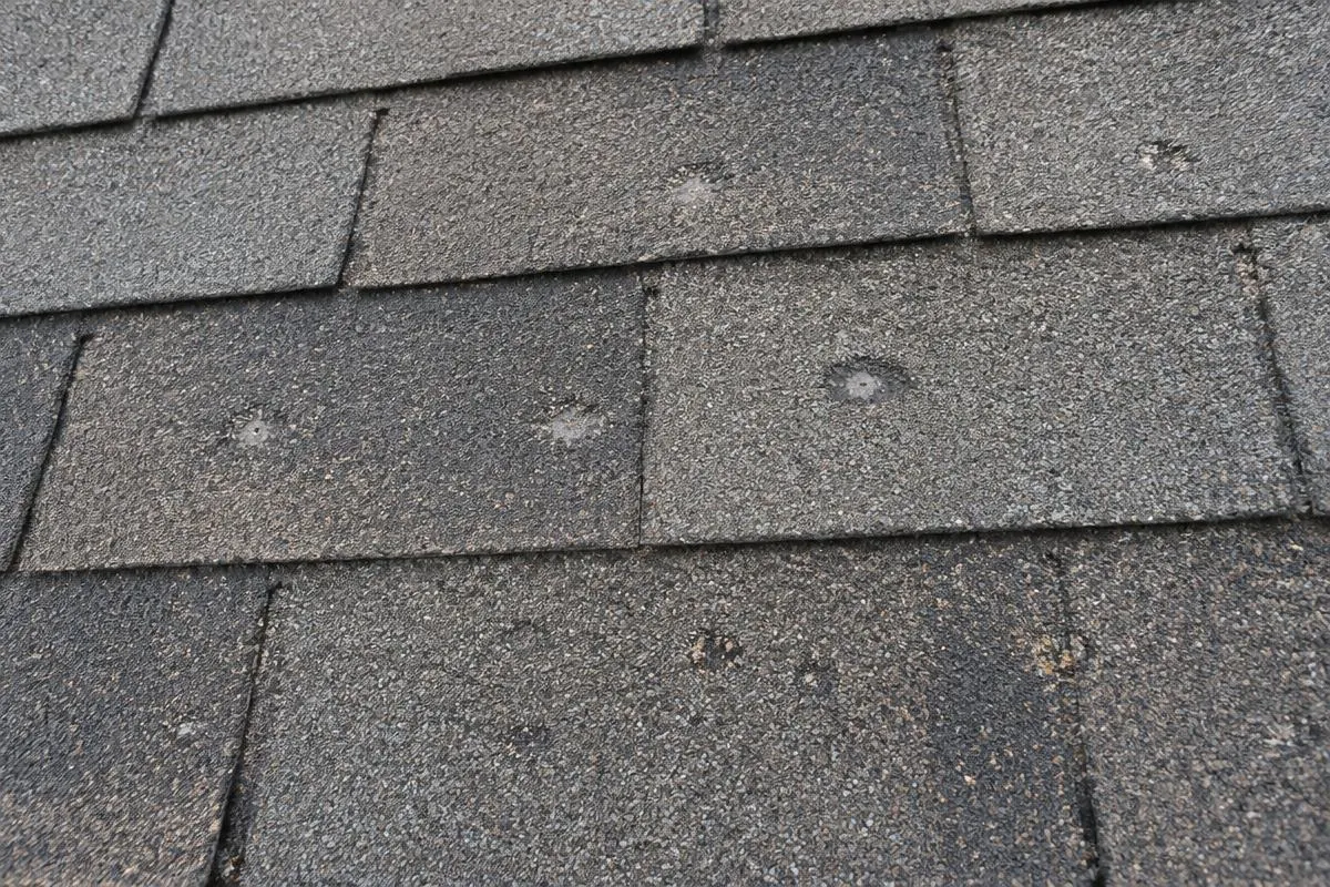 Small surface marks on asphalt shingles